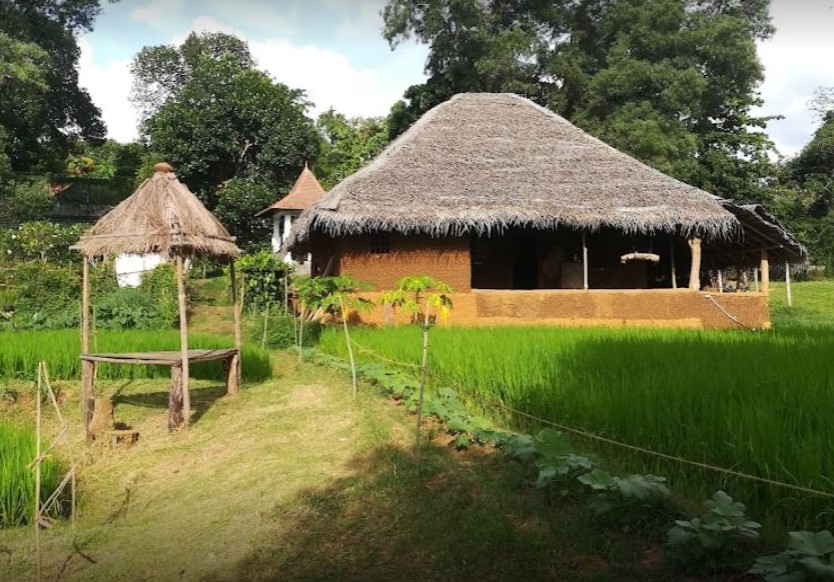 House near paddy field of a ape gama pinnawala